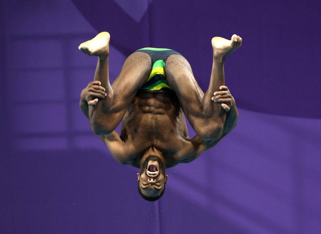Jamaica Yona Roshen Knight-Wisdom competes during the men's 1m springboard heats diving event on day seven of the Commonwealth Games at Sandwell Aquatics Centre in Birmingham, central England, on August 4, 2022. (Photo by Andy Buchanan/AFP Photo)