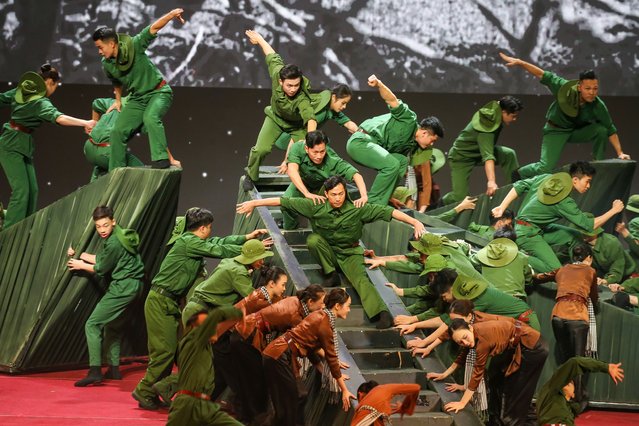Artistists perform during the 80th anniversary of Vietnam's People's Army and the 35th anniversary of the All-People Defence Festival, at the National Convention Center in Hanoi, Vietnam, 20 December 2024. (Photo by Luong Thai Linh/EPA/EFE)