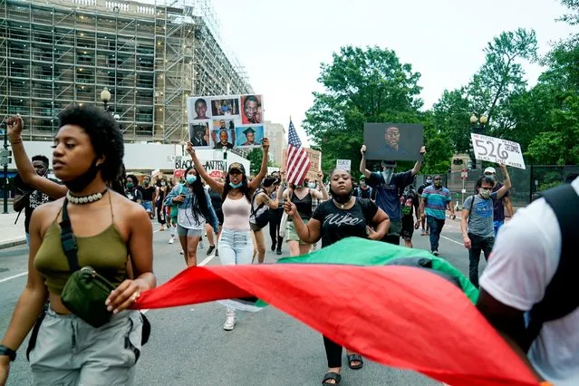 Protesters march against racial inequality in the aftermath of the death in Minneapolis police custody of George Floyd in Washington, U.S., June 10, 2020. (Photo by Erin Scott/Reuters)