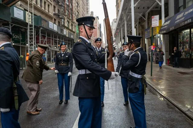 A military ROTC unit prepares to march in the annual Veterans Day Parade on November 11, 2022 in New York City.  Despite the rain, hundreds of people lined 5th Avenue to watch the biggest Veterans Day parade in the United States. This years event included veterans, active soldiers and dozens of school groups participating in the parade which honors the men and women who have served and sacrificed for the country.(Photo by Spencer Platt/Getty Images)