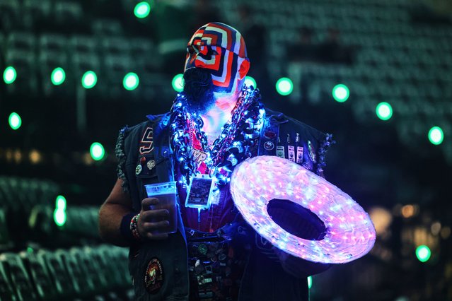 Dale Steil wears face paint and lights before Game 5 of the Western Conference finals in the NHL hockey Stanley Cup playoffs Thursday, May 29, 2025, in Dallas. (Photo by Gareth Patterson/AP Photo)