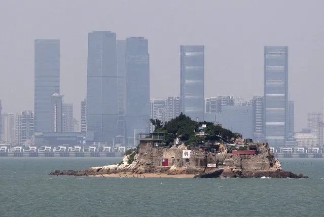 Shiyu, or Lion Islet, which is part of Kinmen county, one of Taiwan's offshore islands, is seen in front of Xiamen, China, in Kinmen county, Taiwan, September 8, 2015. (Photo by Pichi Chuang/Reuters)