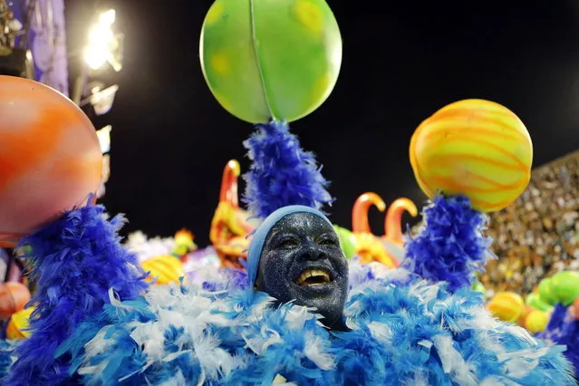 A reveller from the Vila Isabel samba school participates in the annual Carnival parade in Rio de Janeiro's Sambadrome February 12, 2013. (Photo by Sergio Moraes/Reuters)