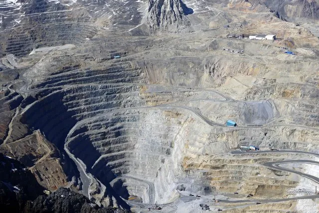 An aerial view of the open pit of CODELCO'S Andina at Los Andes Mountain range, near Santiago city, November 17, 2014. (Photo by Ivan Alvarado/Reuters)