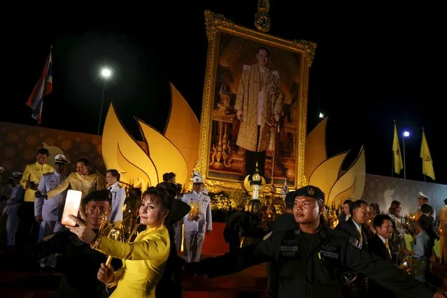 Army officials and guests pose after attending the official ceremony to celebrate Thailand's King Bhumibol Adulyadej 88th birthday in Bangkok, Thailand, December 5, 2015. (Photo by Jorge Silva/Reuters)