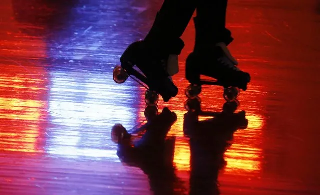 Roller skates are reflected in the floor at “Rich City Skate” in Richton Park, Illinois, January 12, 2015. (Photo by Jim Young/Reuters)