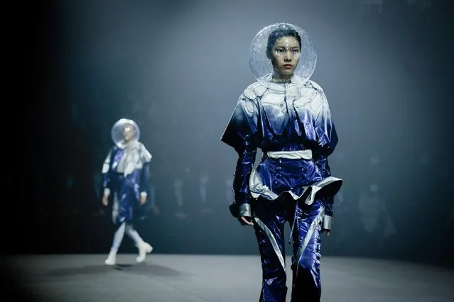 Models display creations for the Hempel Award, the 29th China International Young Fashion Designers Contest, during China Fashion Week in Beijing on March 25, 2021. (Photo by Wang Zhao/AFP Photo)