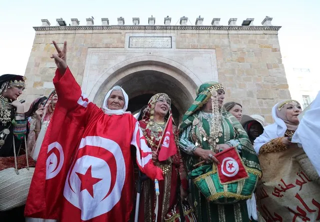 Tunisian women attend a National Women's Day celebration in Tunis, Tunisia, 13 August 2023. Tunisia observes Women's Day twice a year, on 08 March for International Women's Day (IWD) and on 13 August to commemorate the anniversary of the Promulgation of the Personal Status Code. (Photo by Mohamed Messara/EPA)