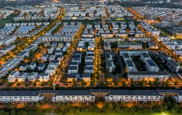 Houses of a residential area are seen from above in Frankfurt, Germany, Thursday, September 7, 2023. The new heating law is supposed to pass legislation on Thursday. (Photo by Michael Probst/AP Photo)