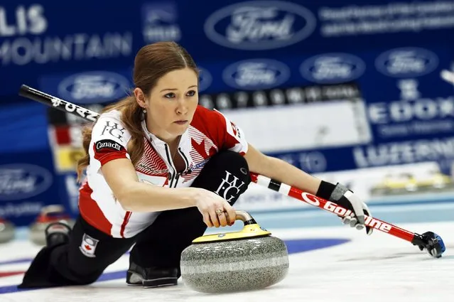 Canada's third Kaitlyn Lawes delivers a stone during her curling round robin game against Scotland at the World Women's Curling Championships in Sapporo March 15, 2015. (Photo by Thomas Peter/Reuters)