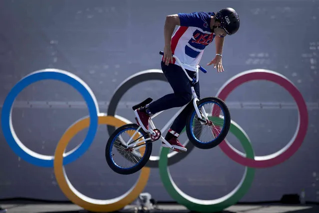 Justin Dowell, of the United States, makes a jump during a BMX Freestyle training session at the 2020 Summer Olympics, Tuesday, July 27, 2021, in Tokyo, Japan. (Photo by Ben Curtis/AP Photo)