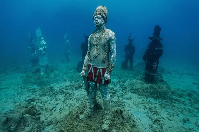 Sculptures by artist Jason deCaires Taylor lying nine feet underwater in Moliniere Bay, Grenada in November 2023. The statues, which portray a range of carnival characters, will become shelters for marine life. (Photo by Jason deCaires Taylor/Media Drum Images)