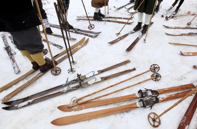 Participants on vintage skis prepare for a traditional historical ski race in the northern Bohemian town of Smrzovka, Czech Republic, February 20, 2016. (Photo by David W. Cerny/Reuters)