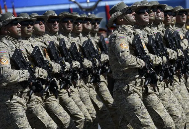 Azerbaijani servicemen march during the Victory Day parade at Red Square in Moscow, Russia, May 9, 2015. (Photo by Reuters/Host Photo Agency/RIA Novosti)