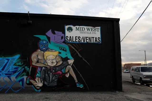 A graffiti depicting a wrestler applying a choke hold to U.S. President Donald Trump is pictured in El Paso, U.S. January 17, 2017. (Photo by Tomas Bravo/Reuters)