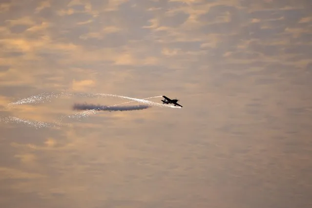 DHL's Twisters & Extra 300 performs during the third day of the Bahrain Air Show 2016 at Sakhir, Bahrain January 23, 2016. (Photo by Hamad I Mohammed/Reuters)