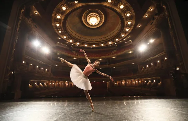 Dancer Fang Mengying from the National Ballet of China takes part in a rehearsal at the municipal theatre in Rio de Janeiro, Brazil, May 24, 2019. Dancers of the National Ballet of China performed the traditional Chinese ballet “Raise the Red Lantern” in Rio de Janeiro on Thursday. They will also present a series of classics in five Brazilian cities during the tour. (Photo by Liu Yu/Xinhua News Agency/Barcroft Media)