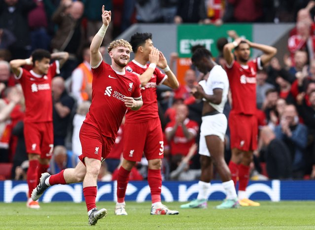 Liverpool's English midfielder #19 Harvey Elliott celebrates scoring the team's fourth goal during the English Premier League football match between Liverpool and Tottenham Hotspur at Anfield in Liverpool, north west England on May 5, 2024. (Photo by Darren Staples/AFP Photo)