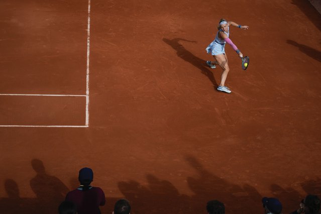 Slovakia's Rebecca Sramkova plays a shot against Amanda Anisimova of the U.S. during their first round match of the French Open tennis tournament at the Roland Garros stadium in Paris, Sunday, May 26, 2024. (Photo by Thibault Camus/AP Photo)