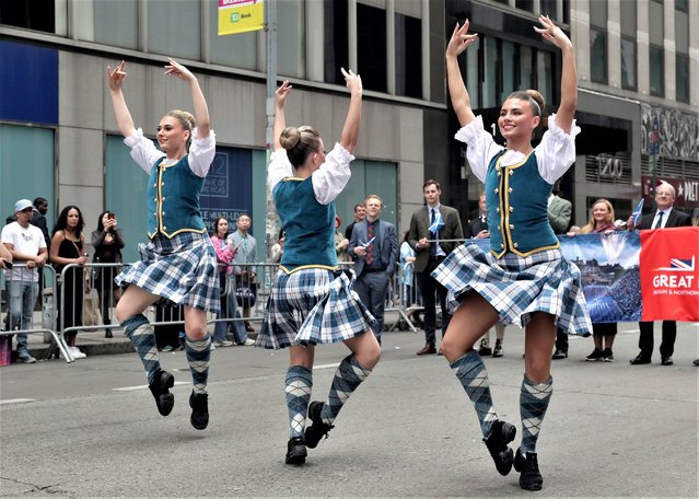 Dancers perform during the annual Tartan Day Parade along Sixth Avenue on April 15, 2023 in New York City. Celebrating its 25th Anniversary, the New York City Tartan Day Parade featured many Scottish clans, Pipers, Dancers and Scottish dogs. (Photo by Andrew Schwartz/SIPA Images/Rex Features/Shutterstock)