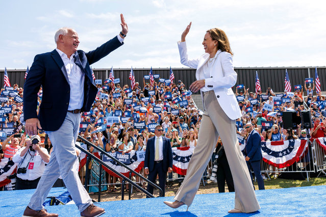 Democratic presidential nominee Vice President Kamala Harris is welcomed by running mate Democratic vice presidential nominee Minnesota Gov. Tim Walz before she delivers remarks at a campaign rally in Eau Claire, Wis., Wednesday, August 7, 2024. (Photo by Kerem Yücel/Minnesota Public Radio via AP Photo)