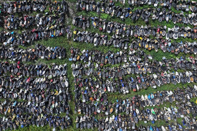 This photo shows an aerial view of abandoned vehicles waiting to be scrapped in Nanjing in eastern China's Jiangsu province on August 22, 2024. (Photo by AFP Photo/China Stringer Network)