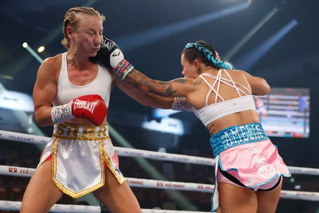 Amber Amelia (R), throws a punch during the Welterweight bout between Amber Amelia and Sara Jalonen as part of the King of the Castle Fight Night at Newcastle Entertainment Centre on May 11, 2022 in Newcastle, Australia. (Photo by Mark Evans/Getty Images)