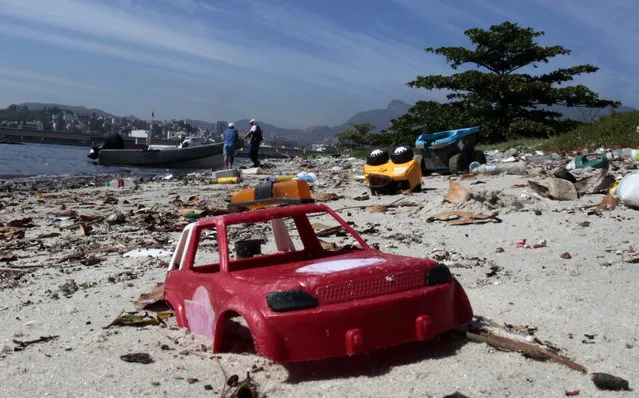 A toy is seen at Pombeba island in the Guanabara Bay in Rio de Janeiro March 12, 2014. (Photo by Sergio Moraes/Reuters)