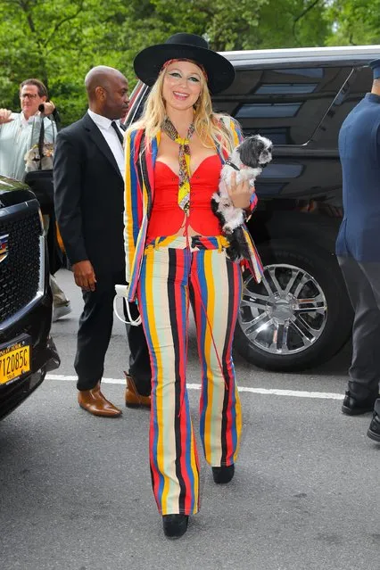 American singer-songwriter Jewel displays her ample cleavage in a colorful ensemble while arriving back at her hotel, after her appearance at the Late Night With Seth Meyers in New York City on June 13, 2022. (Photo by ZapatA/The Mega Agency)