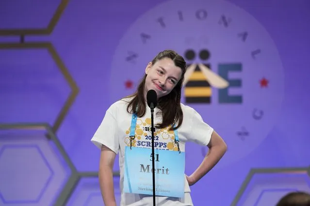 Merit Namaste-Rose, 14, from Oregon, Ill.,stands at the microphone during the Scripps National Spelling Bee, Tuesday, May 31, 2022, in Oxon Hill, Md. (Photo by Alex Brandon/AP Photo)