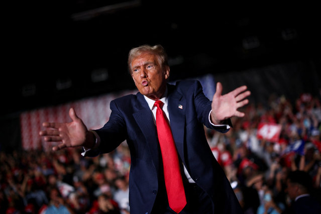 Republican presidential nominee and former U.S. President Donald Trump reacts during a rally in Greensboro, North Carolina on October 23, 2024. (Photo by Carlos Barria/Reuters)