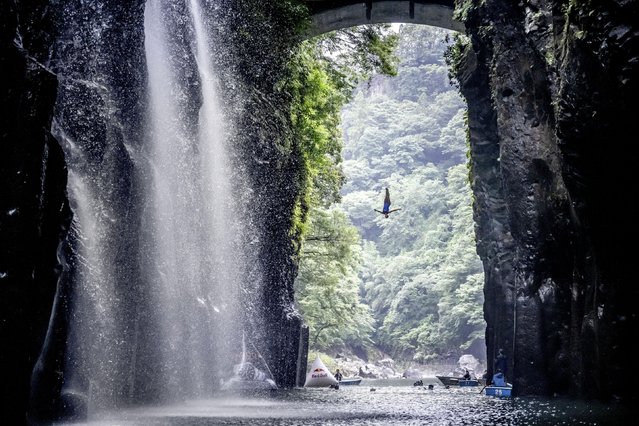 In this handout image provided by Red Bull, Rhiannan Iffland of Australia dives from the 21 metre platform during the first competition day of the fourth stop of the Red Bull Cliff Diving World Series on August 02, 2023 at Takachiho, Japan. (Photo by Romina Amato/Red Bull via Getty Images)
