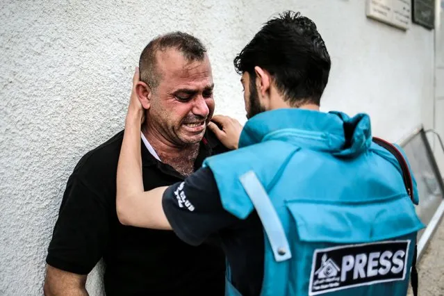 Family members mourn the killing of 19-year-old Noor Zweidi from Beit Hanon after he was targeted in front of his house in the northern Gaza Strip in an Israeli air raid on August 6, 2022. (Photo by Hosam Salem/Al Jazeera)