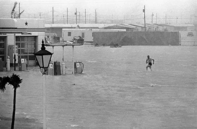 This was the scene in Key West, Florida on September 8, 1965, after Hurricane Betsy slammed into this most southern Key with 100-miles-per-hour winds. Two feet of water stands in this gas station near downtown Key West. (Photo by Horace Cort/AP Photo)