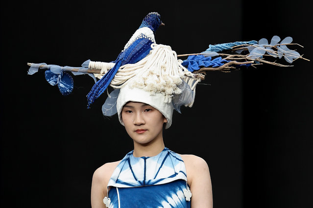 A model showcases designs on the runway at the 5th Anniversary joint release of invited works 2022 collection show during the day five of Beijing Fashion Week at Wangfujing street on September 19, 2022 in Beijing, China. (Photo by Lintao Zhang/Getty Images)