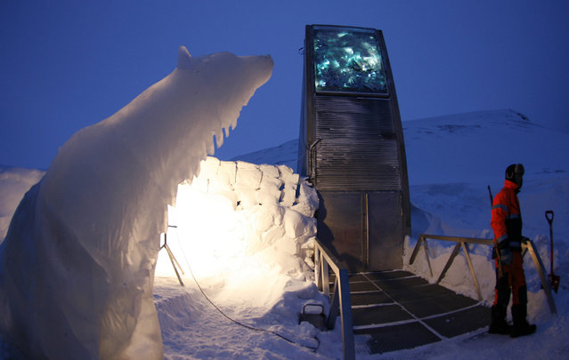 A polar bear sculpture made of ice stands outside the Global Seed Vault in Longyearbyen February 25, 2008. (Photo by Bob Strong/Reuters)