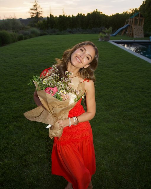 American actress Jessica Alba poses with a stunning bouquet on May 12, 2025. (Photo by jessicaalba/Instagram)