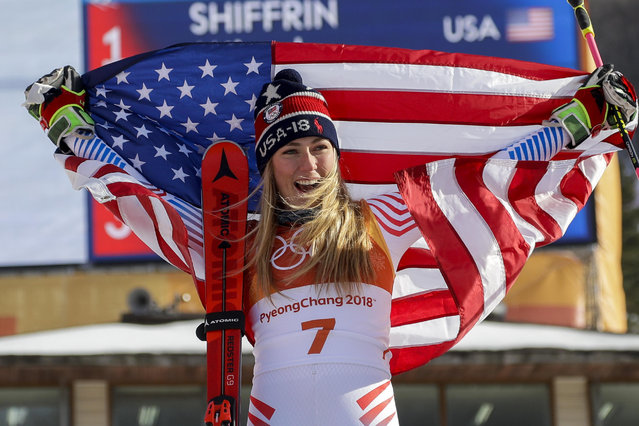 Mikaela Shiffrin, of the United States, celebrate her gold medal during the venue ceremony at the Women's Giant Slalom at the 2018 Winter Olympics in Pyeongchang, South Korea, Thursday, February 15, 2018. (Photo by Morry Gash/AP Photo)