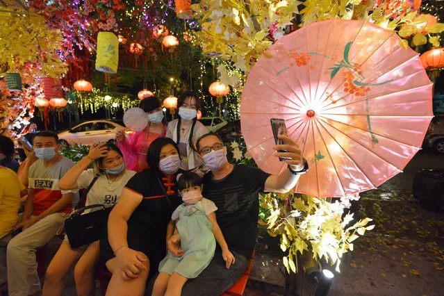 People take part in a lantern fair to celebrate the Mid-Autumn Festival in Tangkak, Johor, Malaysia, October 1, 2020. (Photo by Xinhua News Agency/Rex Features/Shutterstock)