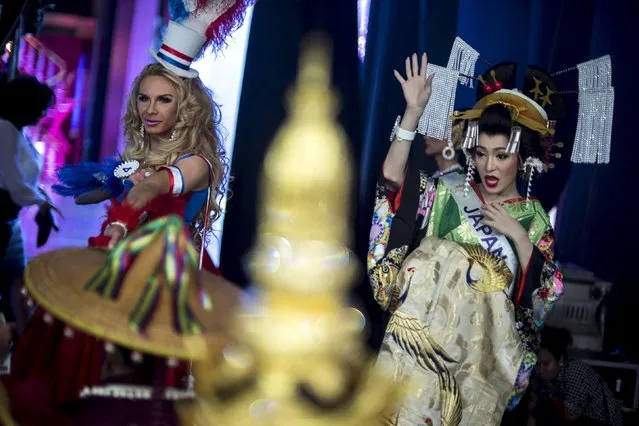 Contestants prepare to go on stage during the Miss International Queen 2015 transgender/transsexual beauty pageant in Pattaya, Thailand, November 6, 2015. (Photo by Athit Perawongmetha/Reuters)