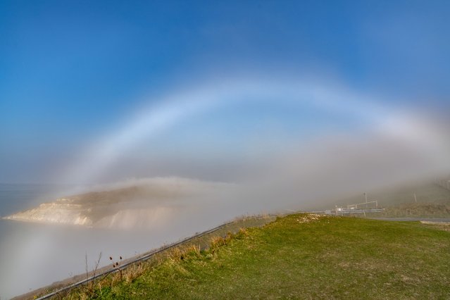 A rare fog bow over Needles Headland on the Isle of Wight in UK late Wednesday afternoon, March 26, 2025. (Photo by Paul Jacobs/Picture Exclusive)