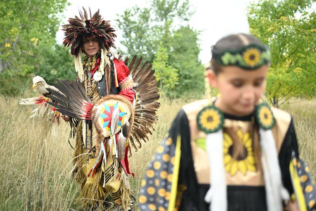 Thomas Yellow Horse Davis prepares to dance during a ceremony at Indigenous Peoples' Day on October 13, 2025 in Denver, Colorado. Denver passed legislation this year to honor Indigenous People's Day, rather than Columbus Day, as a paid city holiday, and today is the first observance of this day, featuring Coloradan Indigenous ceremonies, traditional dances, and musical performances. (Photo by Mark Makela/Getty Images)