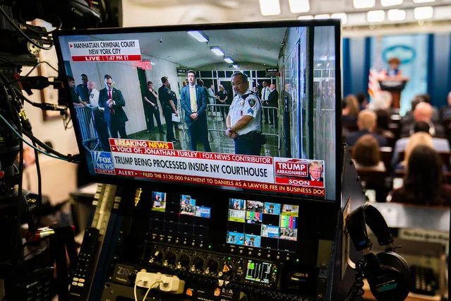 Former President Donald Trump’s arraignment on screen during White House Press Secretary Karine Jean-Pierre daily press briefing in the James Brady Room at the White House on April 4, 2023. (Photo by Demetrius Freeman/The Washington Post)