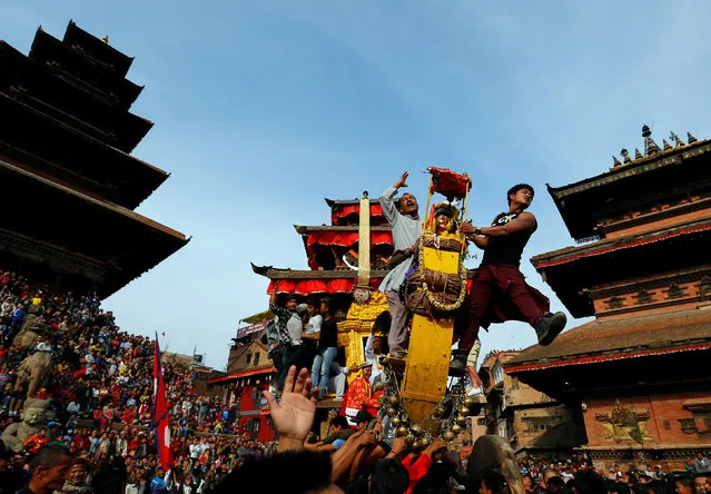The chariot of God Bhairab is pulled through the city centre during the Biska Festival also known as Bisket Festival in Bhaktapur, Nepal April 10, 2018. (Photo by Navesh Chitrakar/Reuters)