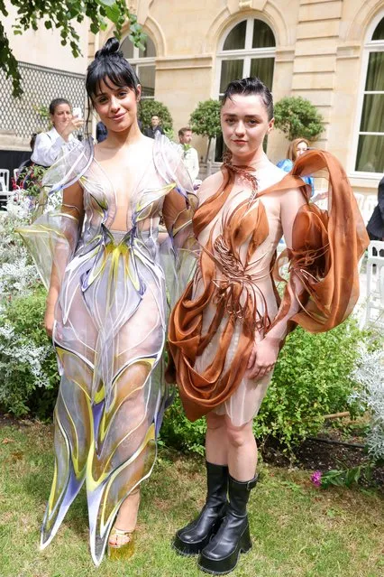 English actress Maisie Williams (R) and American singer-songwriter Camila Cabello attends the Iris Van Herpen Haute couture Fall/Winter 2023/2024 show as part of Paris Fashion Week on July 03, 2023 in Paris, France. (Photo by Pierre Suu/Getty Images)