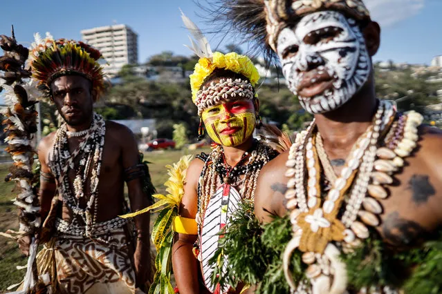 Traditional dancers are seen at Ela Beach, near a venue of the Asia-Pacific Economic Cooperation (APEC) summit in Port Moresby, Papua New Guinea, 13 November 2018. The APEC summit brings together world leaders from its 21 member nations and is being hosted for the first time by Papua New Guinea. (Photo by Mast Irham/EPA/EFE)