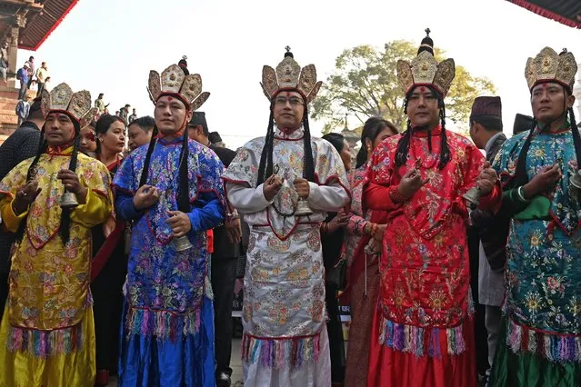 Members of the Nepali ethnic Newar community participate in celebrations for the Newar New Year in Kathmandu on November 14, 2023. (Photo by Prakash Mathema/AFP Photo)