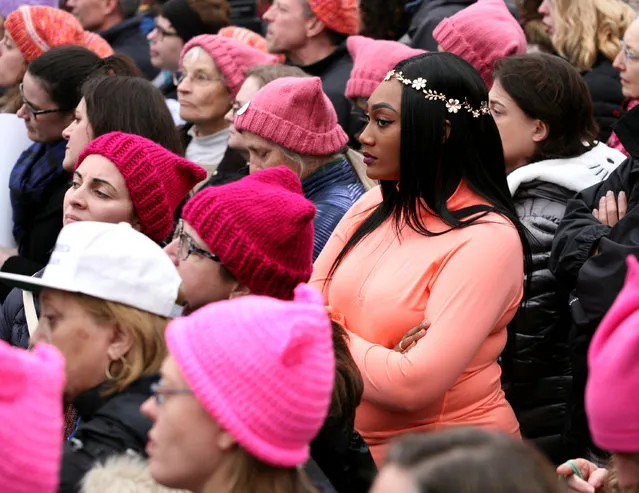 People listen to speeches at the Women's March in opposition to the agenda and rhetoric of President Donald Trump Washington, DC, U.S., January 21, 2017. (Photo by Canice Leung/Reuters)