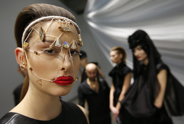 A model poses before she present a creation by Augustin Teboul during the Berlin Fashion Week Autumn/Winter 2014, in Berlin January14, 2014. (Photo by Fabrizio Bensch/Reuters)