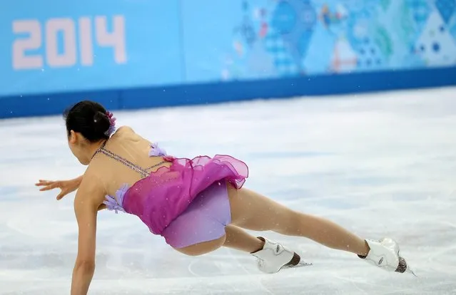Mao Asada of Japan falls during the women's Short Programme of the Figure Skating team event at Iceberg Skating Palace during the Sochi 2014 Olympic Games, Sochi, Russia, 08 February 2014. (Photo by How Hwee Young/EPA)